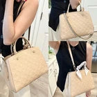 Louis Vuitton Montaigne BB Dune Empreinte Leather Top Handle Bag