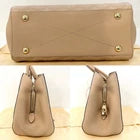 Louis Vuitton Montaigne BB Dune Empreinte Leather Top Handle Bag