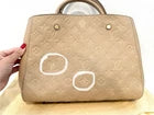 Louis Vuitton Montaigne BB Dune Empreinte Leather Top Handle Bag